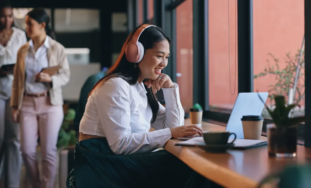Female learning a language on her laptop