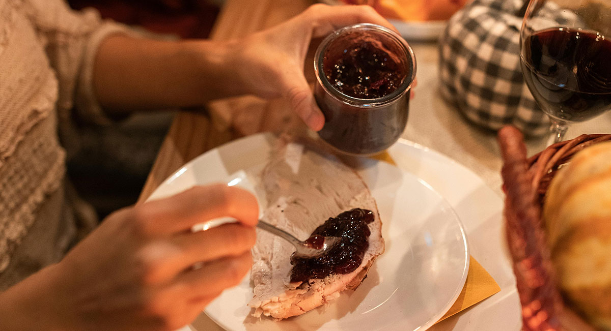 Cranberry sauce with turkey for Thanksgiving.