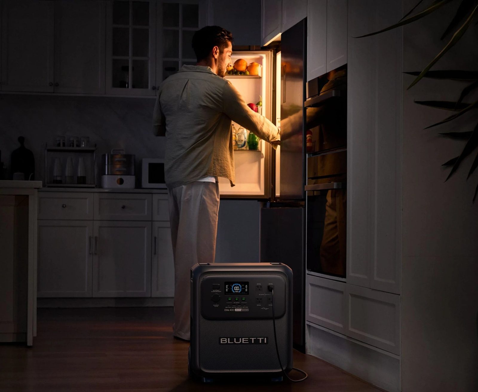 BLUETTI power station running a fridge during a home outage