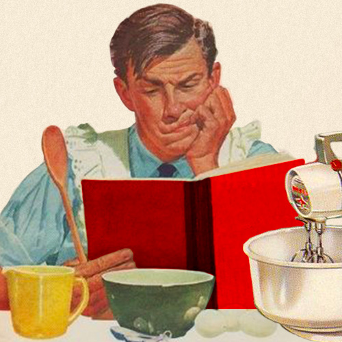 Man reading a red cookbook.