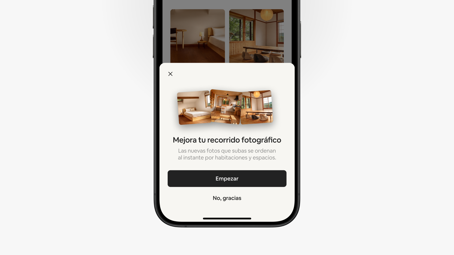 Una pantalla emergente en la aplicación de Airbnb dice «Mejora tu recorrido fotográfico» encima de dos opciones en los botones, «Vamos» y «No, gracias».