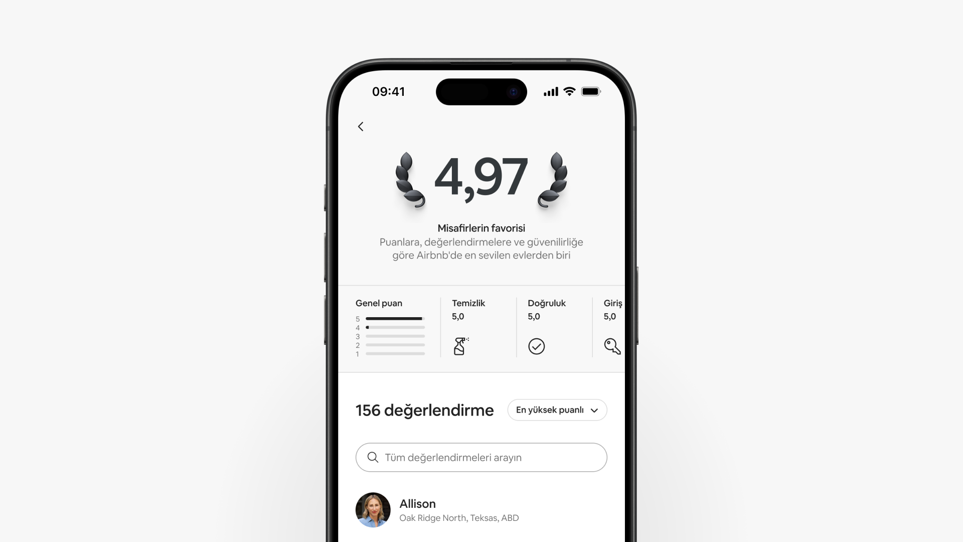 Bir akıllı telefon ekranında genel puanı 4,97 olan ve Misafirlerin favorisi olarak yer alan bir kaydın puan sayfası gösteriliyor.