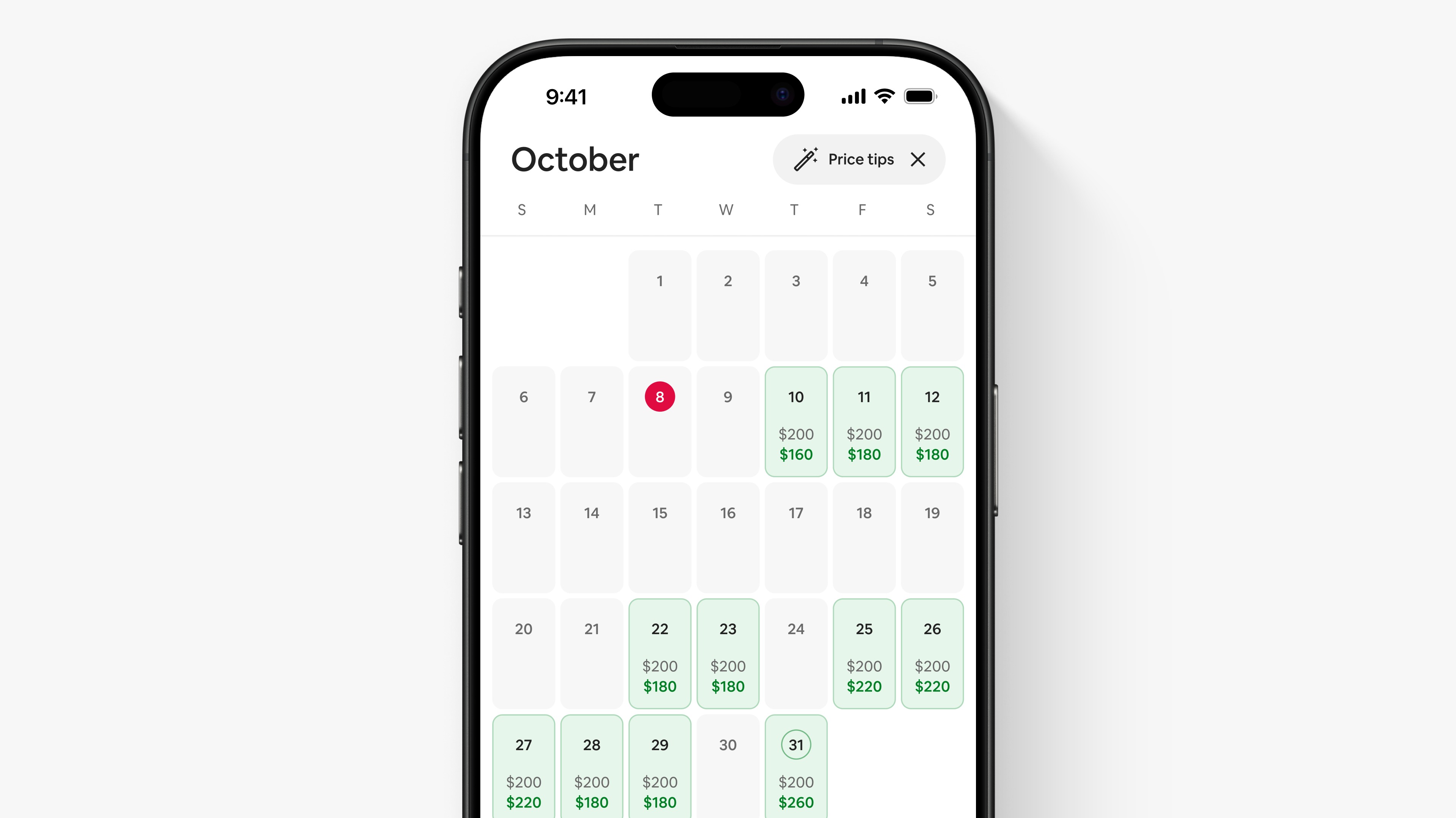 Una schermata nell'app di Airbnb mostra il calendario di ottobre di un host con i consigli sul prezzo che appaiono in verde sotto il prezzo medio per notte.