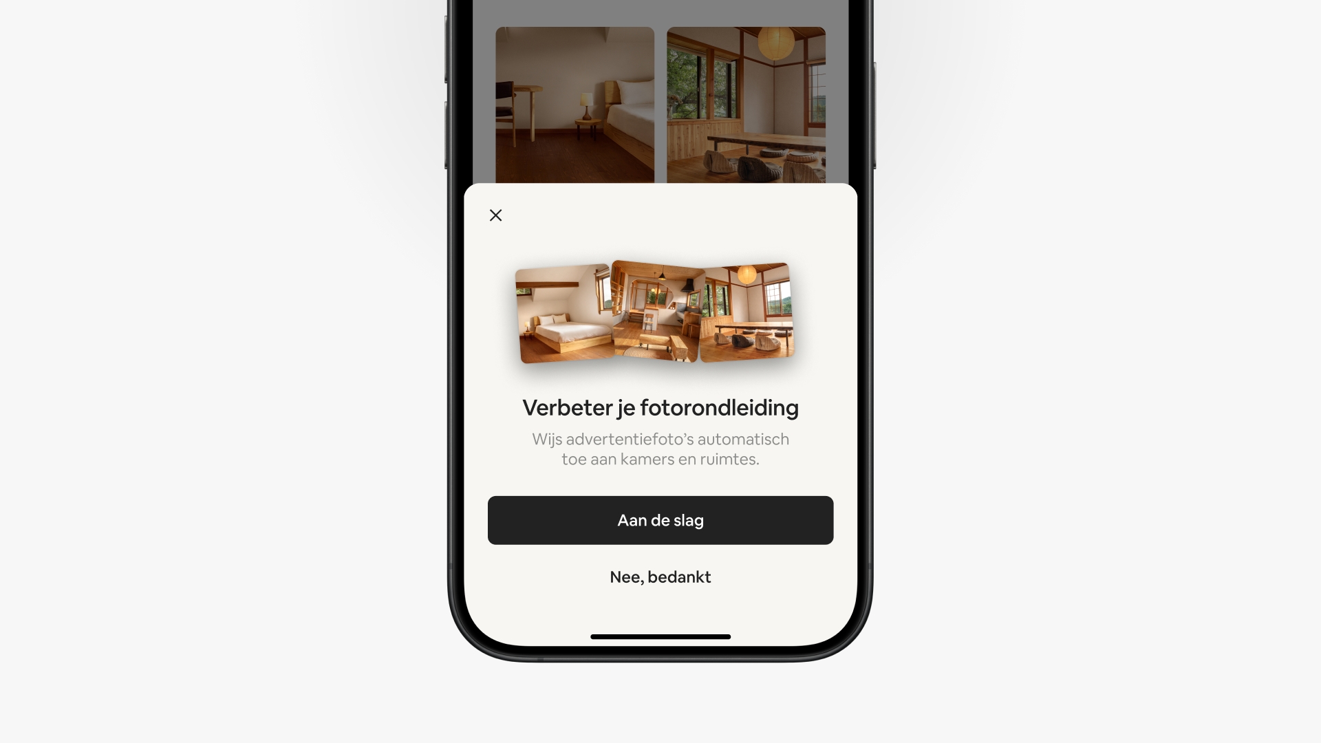 In een pop-upvenster in de Airbnb-app staat 'Verbeter je fotorondleiding' boven twee knoppen, 'Aan de slag' en 'Nee, bedankt'.