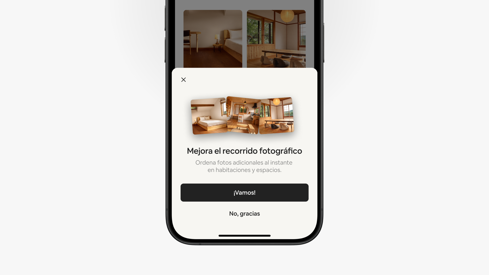 Una pantalla emergente en la aplicación de Airbnb dice “Mejora tu recorrido fotográfico” sobre dos opciones en los botones, “Vamos” y “No, gracias”.