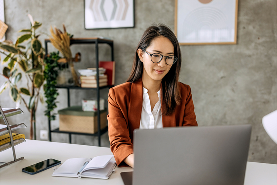 woman working at a laptop