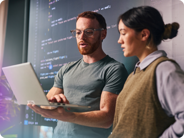 Product manager looking uncertain at her laptop, questioning whether her team is building the right thing
