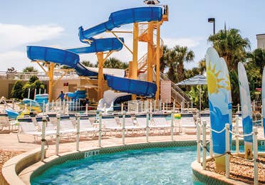 Pool with waterslide at Cape Canaveral Beach Resort.