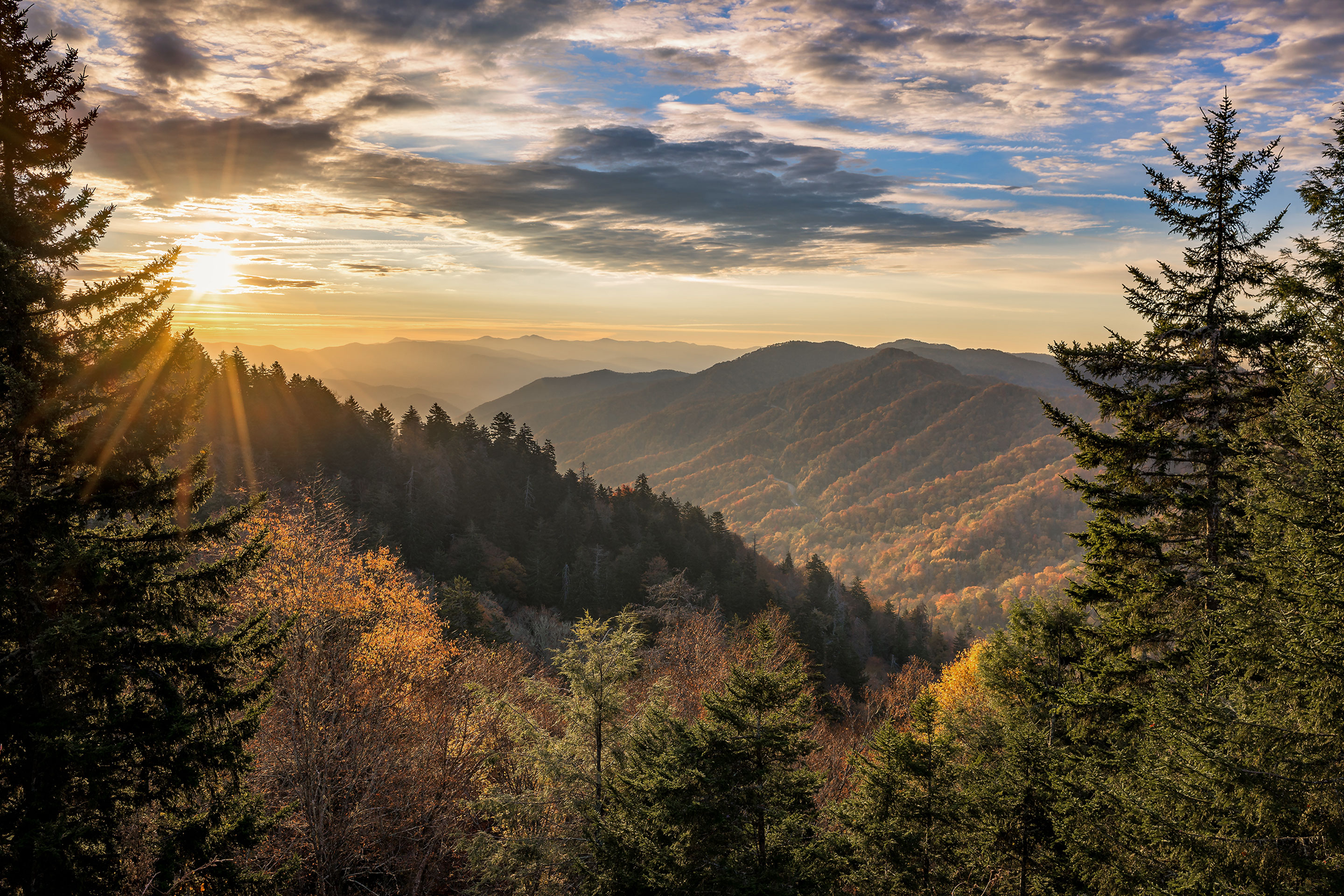 An orange-colored sky over the Tennessee mountains.