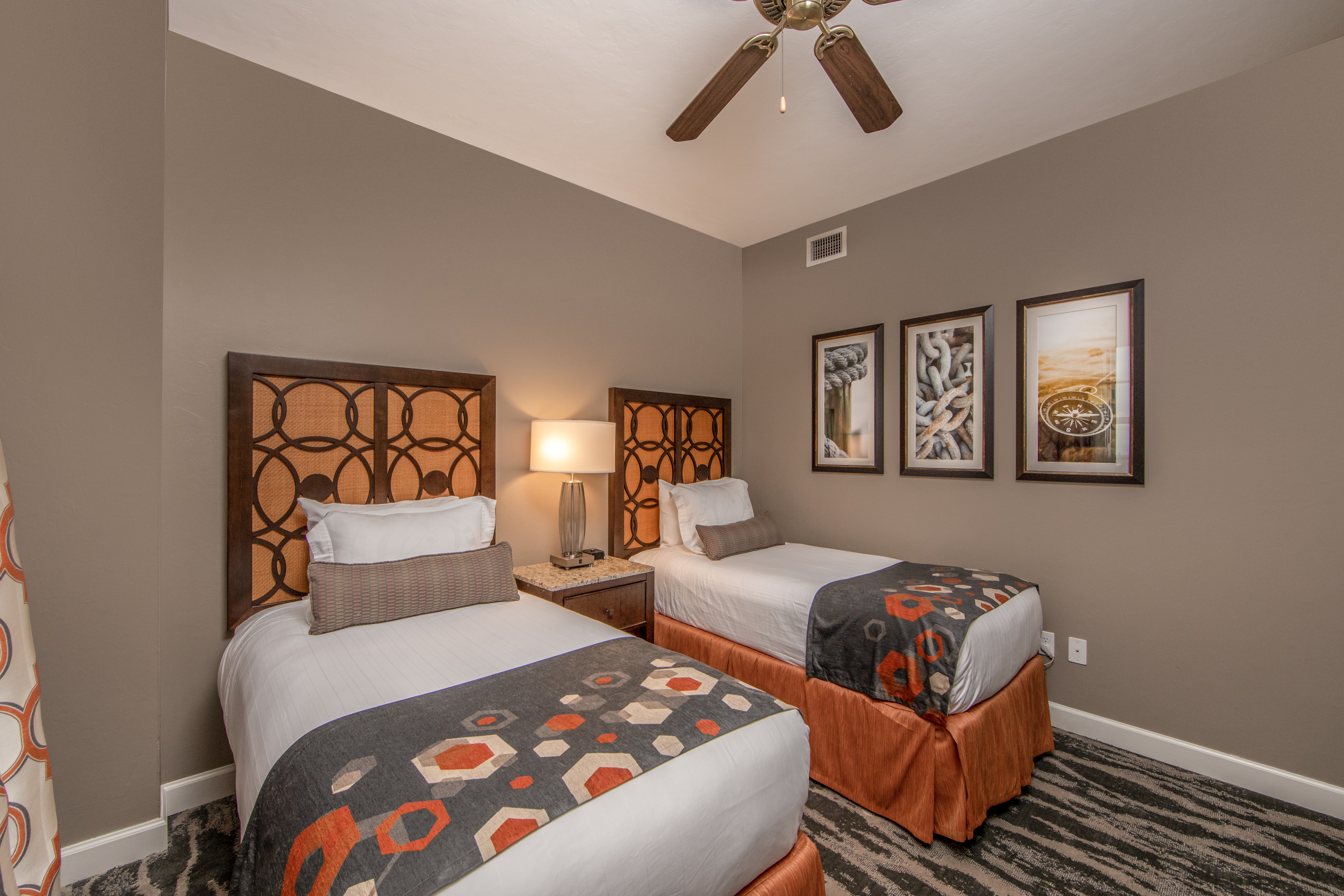 Bedroom with two twin beds in a three-bedroom villa at Sunset Cove Resort in Marco Island, Florida