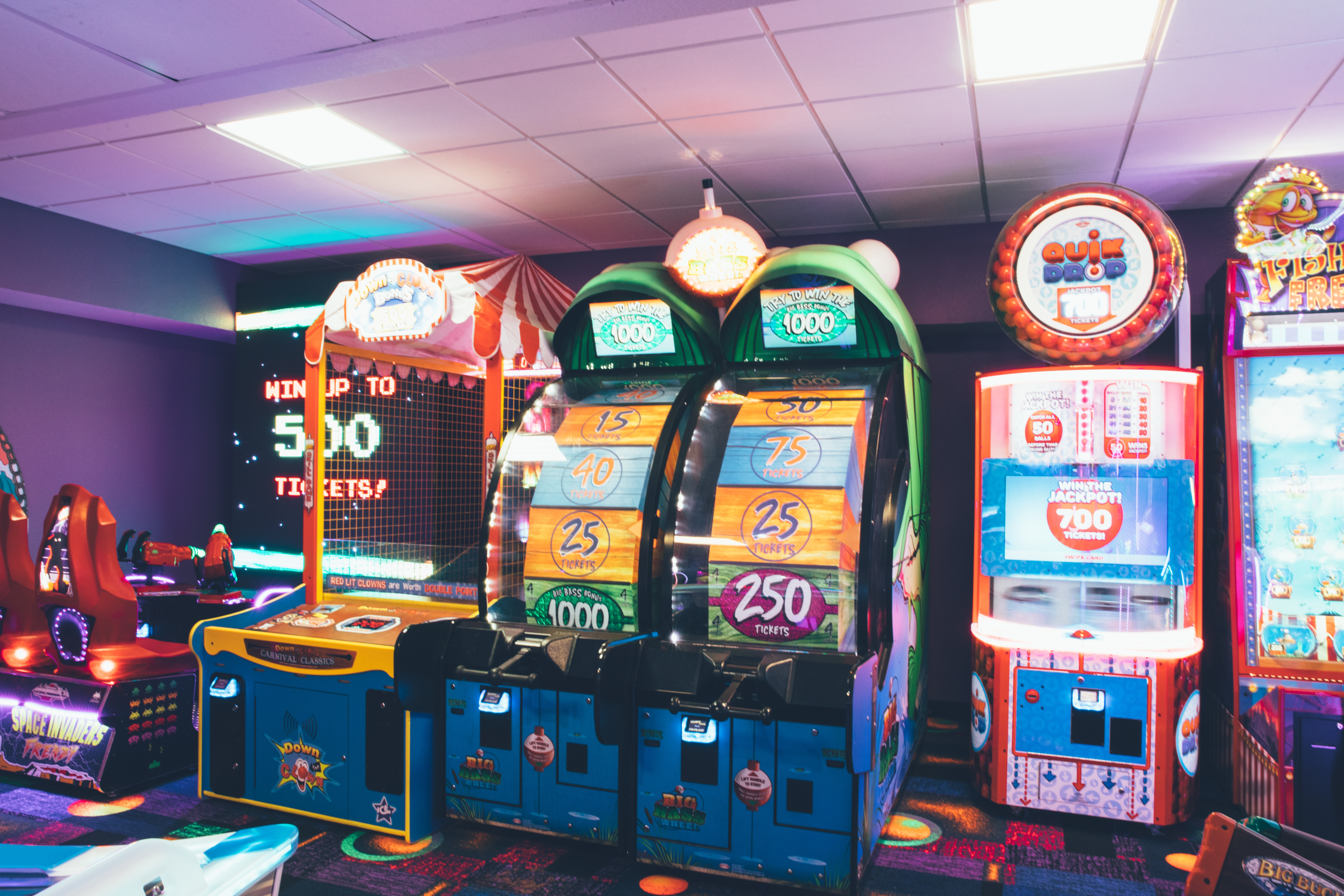 Arcade with Space Invaders, Quik Drop, and other arcade games in West Village at Orange Lake Resort near Orlando, Florida