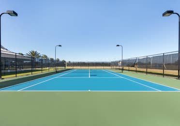 Outdoor tennis court at Orlando Breeze Resort in Florida.