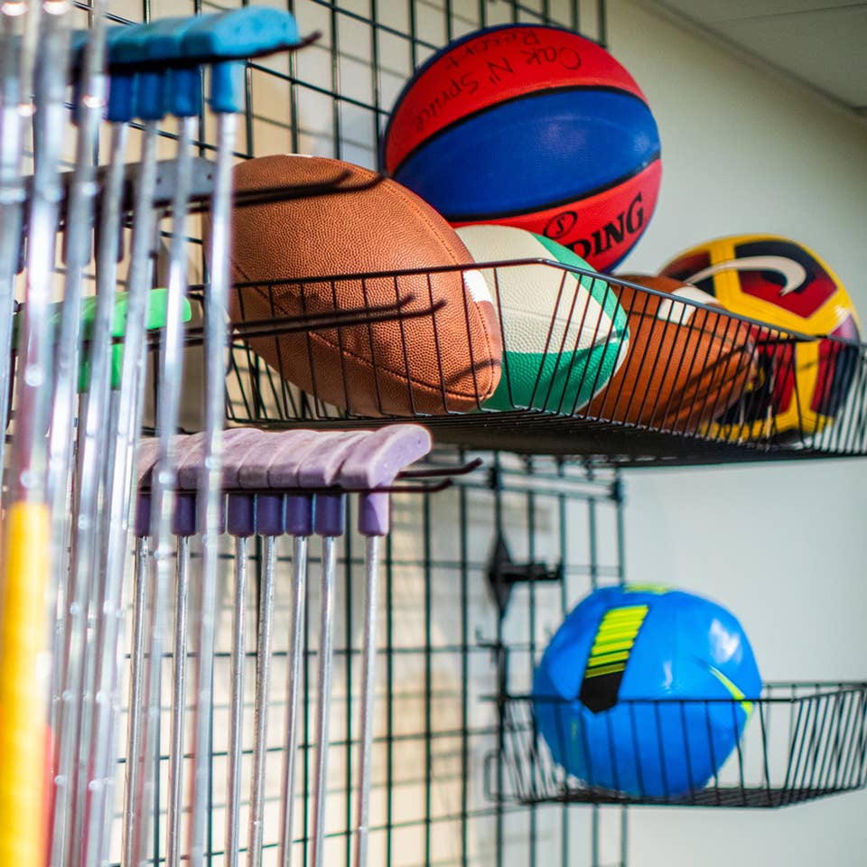 Putters, footballs, soccer balls and basketballs at the Marketplace at Oak n' Spruce Resort in South Lee, Massachusetts.