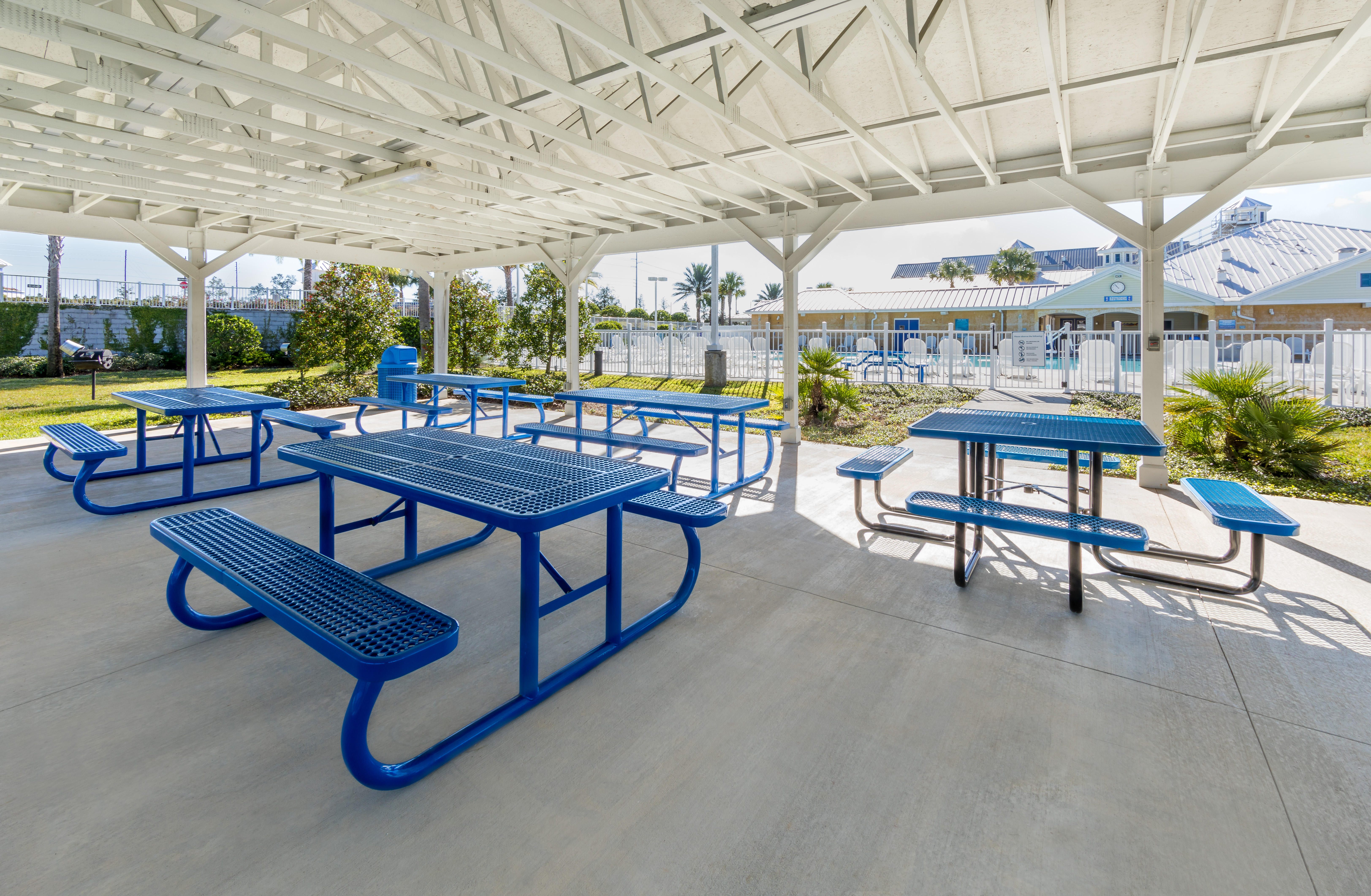 Picnic tables in pavilion at Orlando Breeze Resort in Florida.
