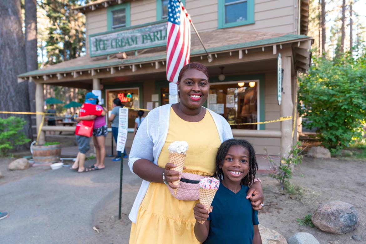 Karen and her son with their ice cream cones outside Camp Richardson’s Ice Cream Parlor.