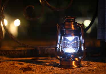Lit lantern at night.