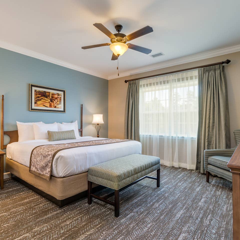 Bedroom in a three-bedroom villa at Williamsburg Resort