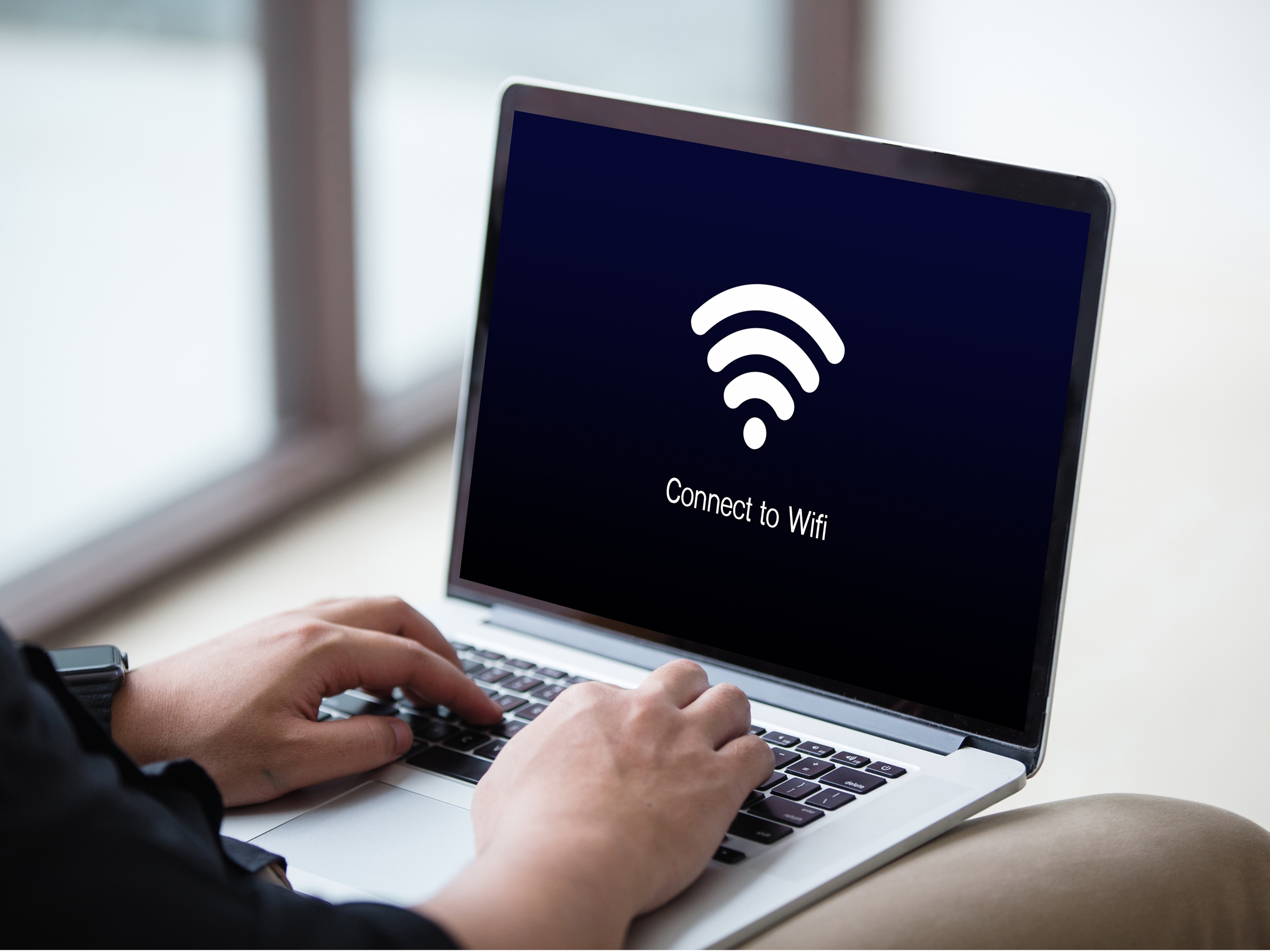 Laptop displaying a Wi-Fi connection screen, representing complimentary Wi-Fi at Banneker in Washington, D.C. 