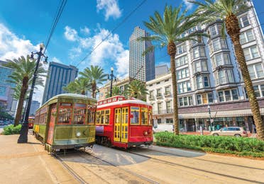 Two New Orleans streetcars in the city.