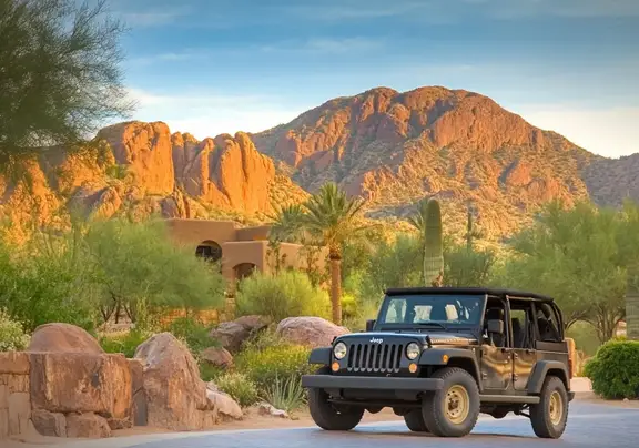 A guided Jeep tour through the red rock formation Scottsdale AZ resort.