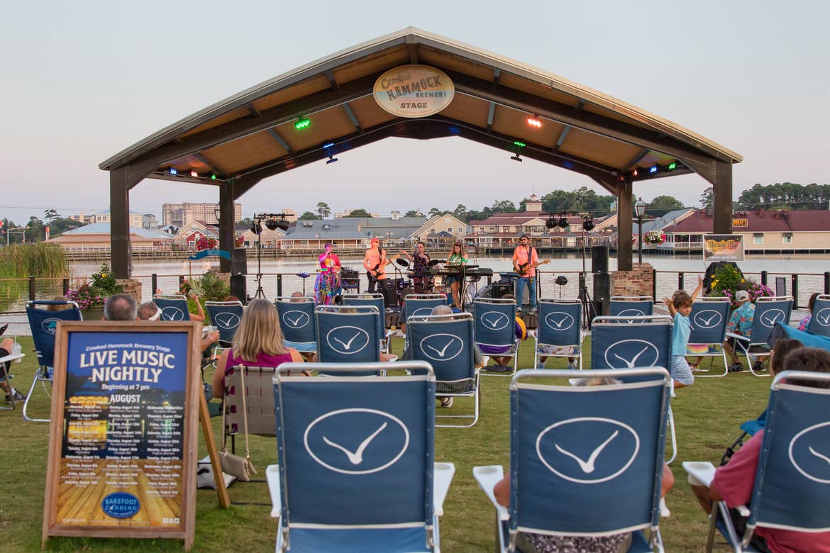 Guests enjoy outdoor entertainment at Barefoot Landing in Myrtle Beach, SC.
