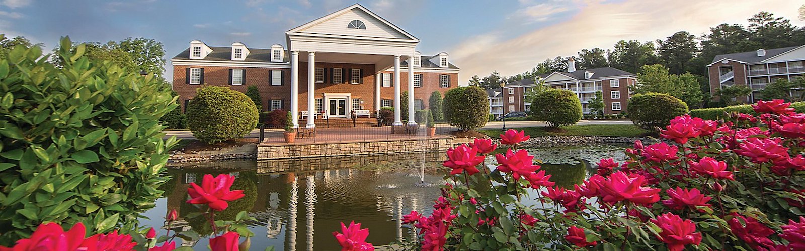 A scenic view of Williamsburg Resort through the flowers