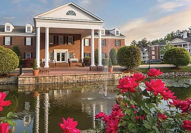 A scenic view of Williamsburg Resort through the flowers