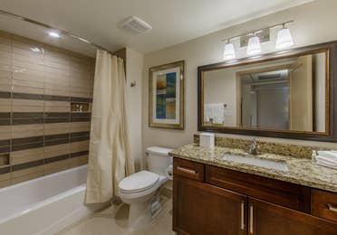 Bathroom with shower/tub combination and sink with mirror in a two-bedroom villa at Scottsdale Resort