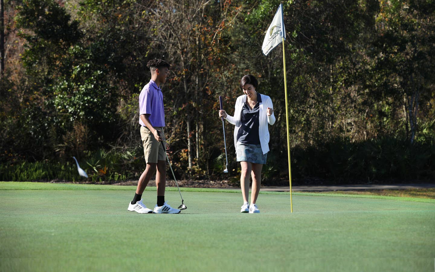 Two golfers at The Legends at Orange Lake Resort near Orlando, Florida.