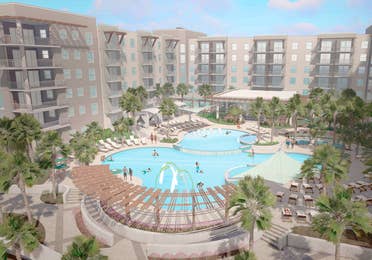 A digital rendering of a resort exterior with a pool, palm trees and guests in swimwear.