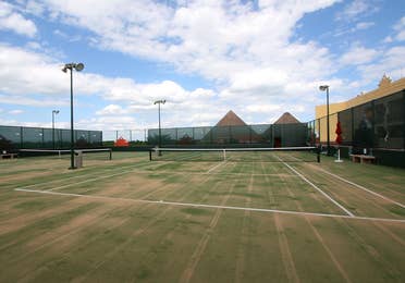 Angled view of the lawn tennis courts, at The Royal Haciendas, in Playa del Carmen, Mexico