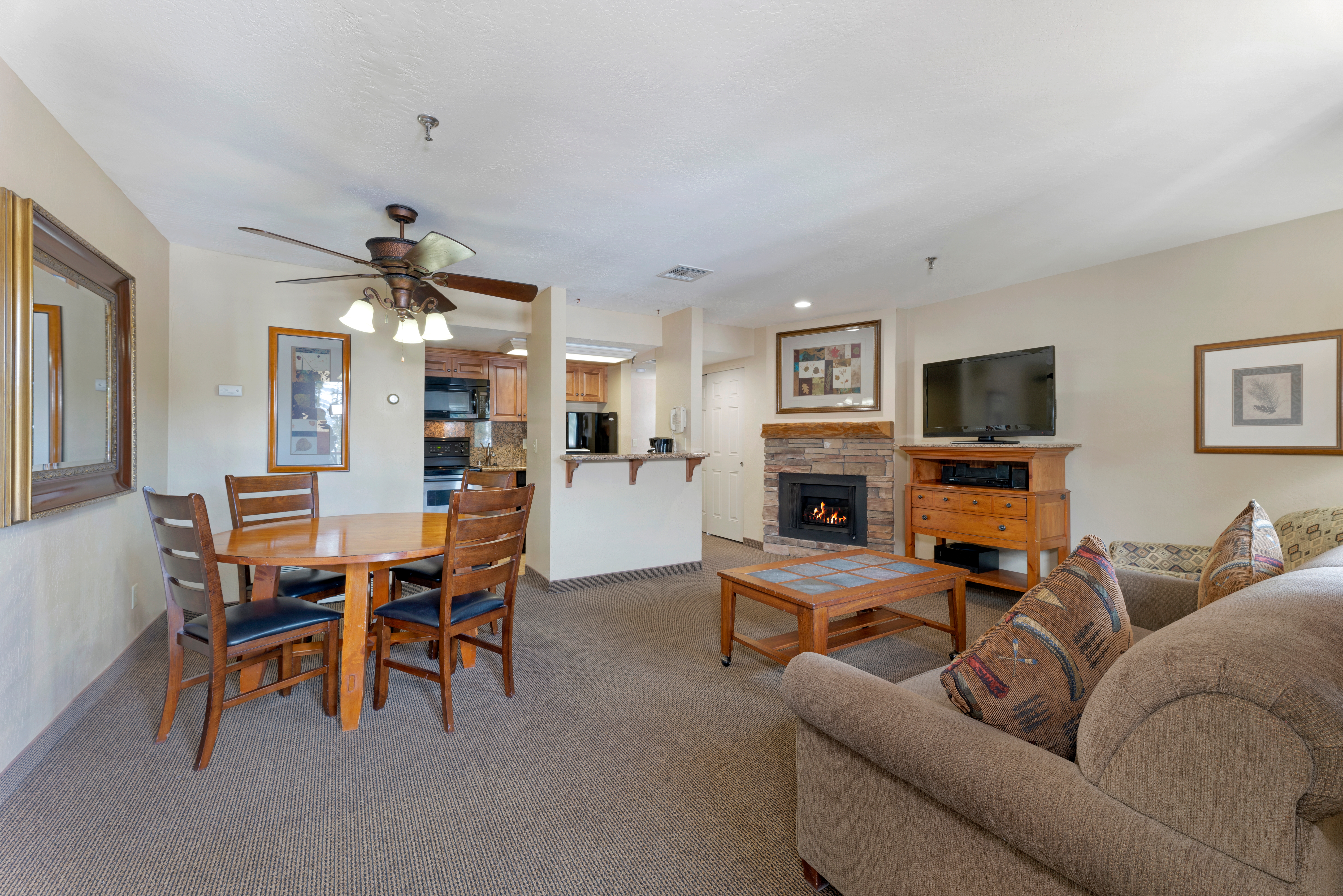 Living room and dining area in a Crest Pointe villa at Tahoe Ridge Resort