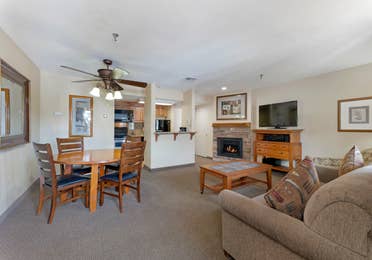 Living room and dining area in a Crest Pointe villa at Tahoe Ridge Resort