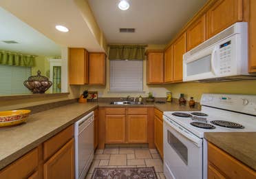 Kitchen and amenities in a two-bedroom presidential villa at the Holiday Hills Resort in Branson Missouri.