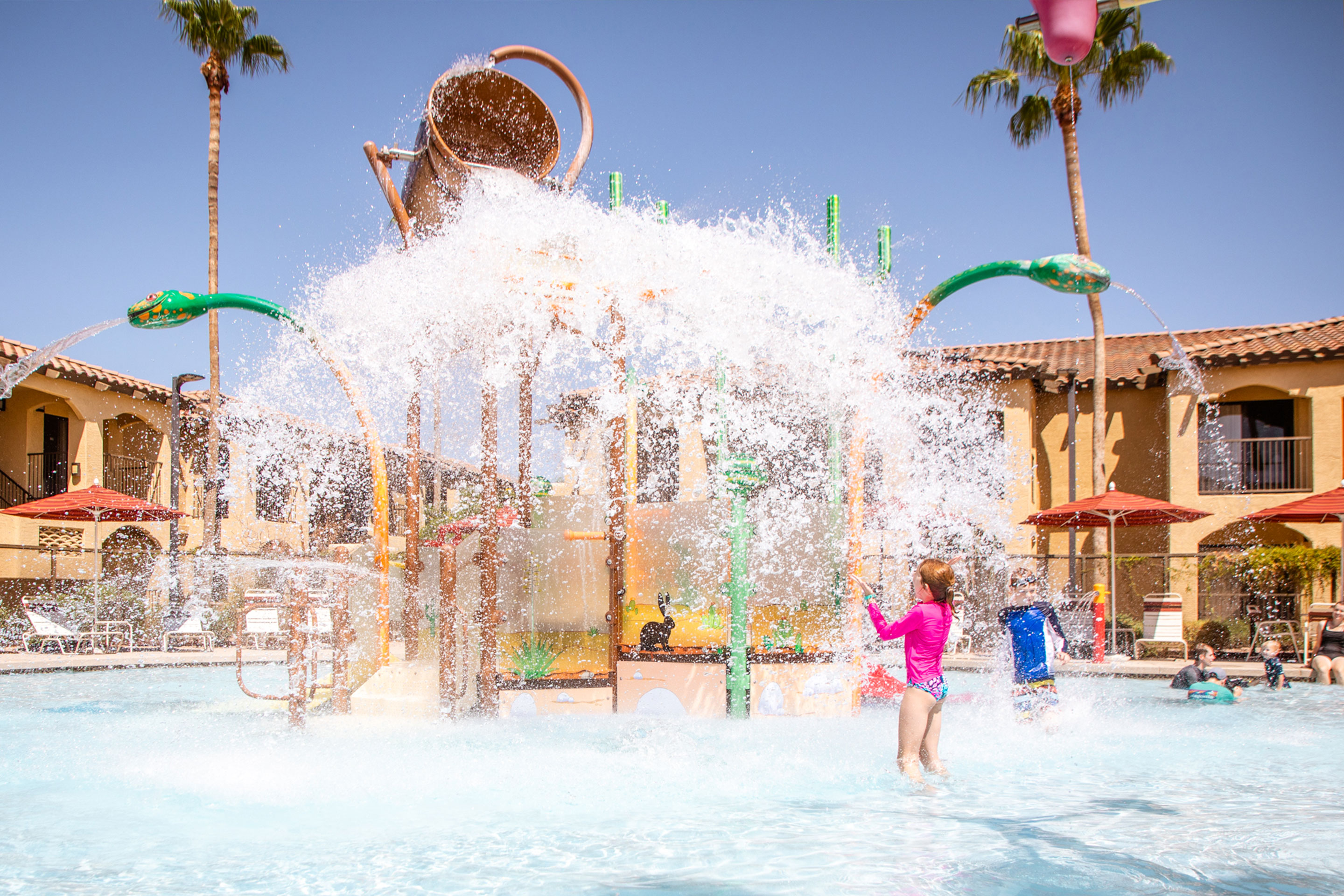 The Averett Family enjoys the refreshing Splash Canyon features at our Scottsdale Resort.