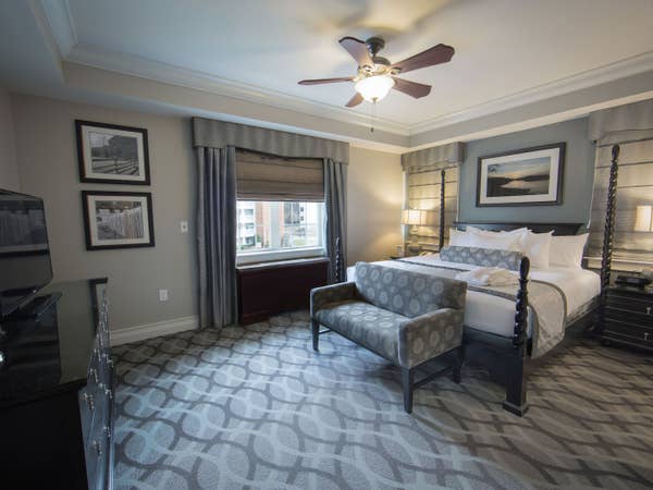 Bedroom in a Signature Collection villa at Williamsburg Resort