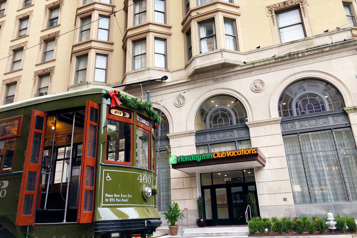A green trolley decorated for the holidays stops in front of our resort in New Orleans, Louisiana.