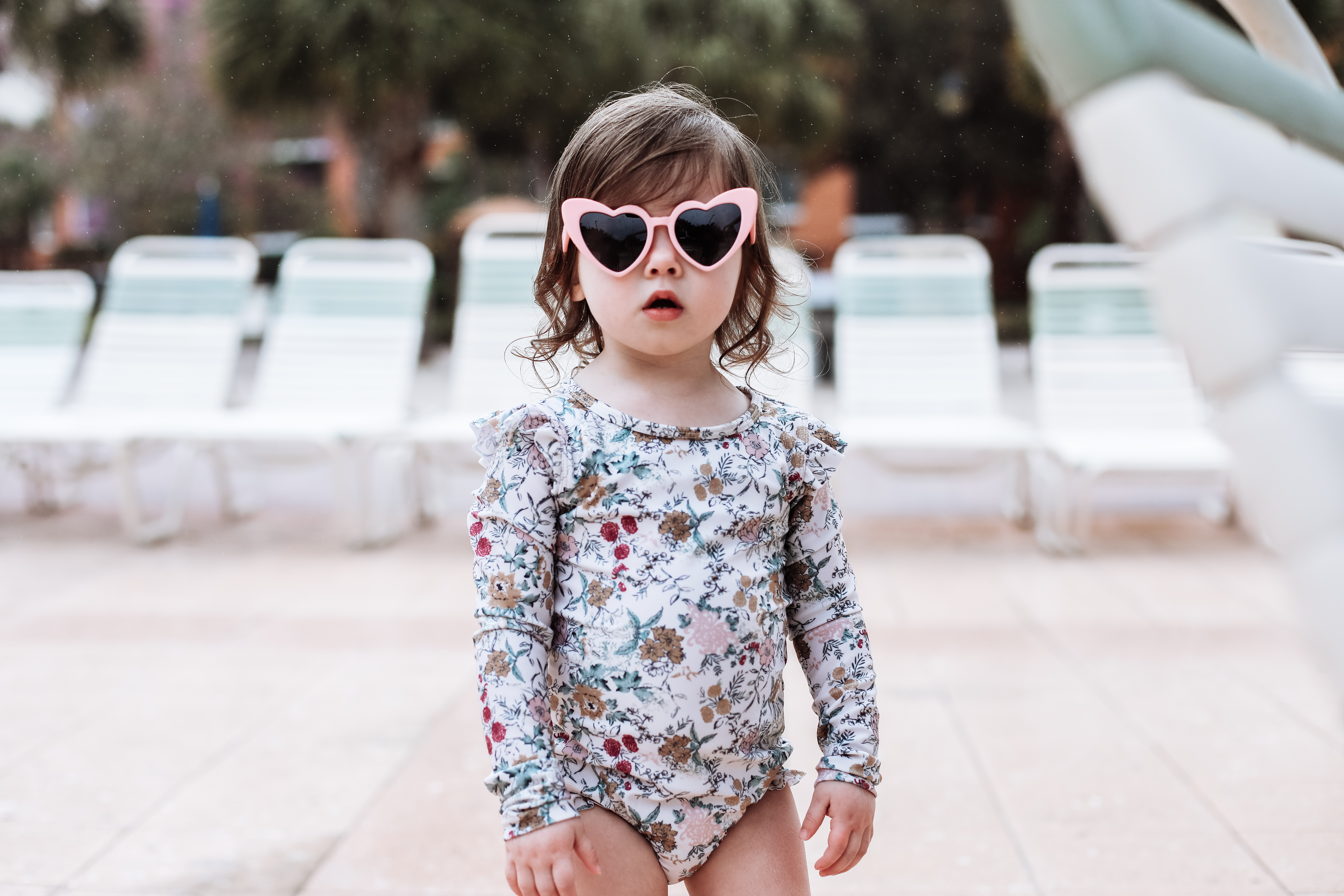 Mia's daughter in heart sunglasses