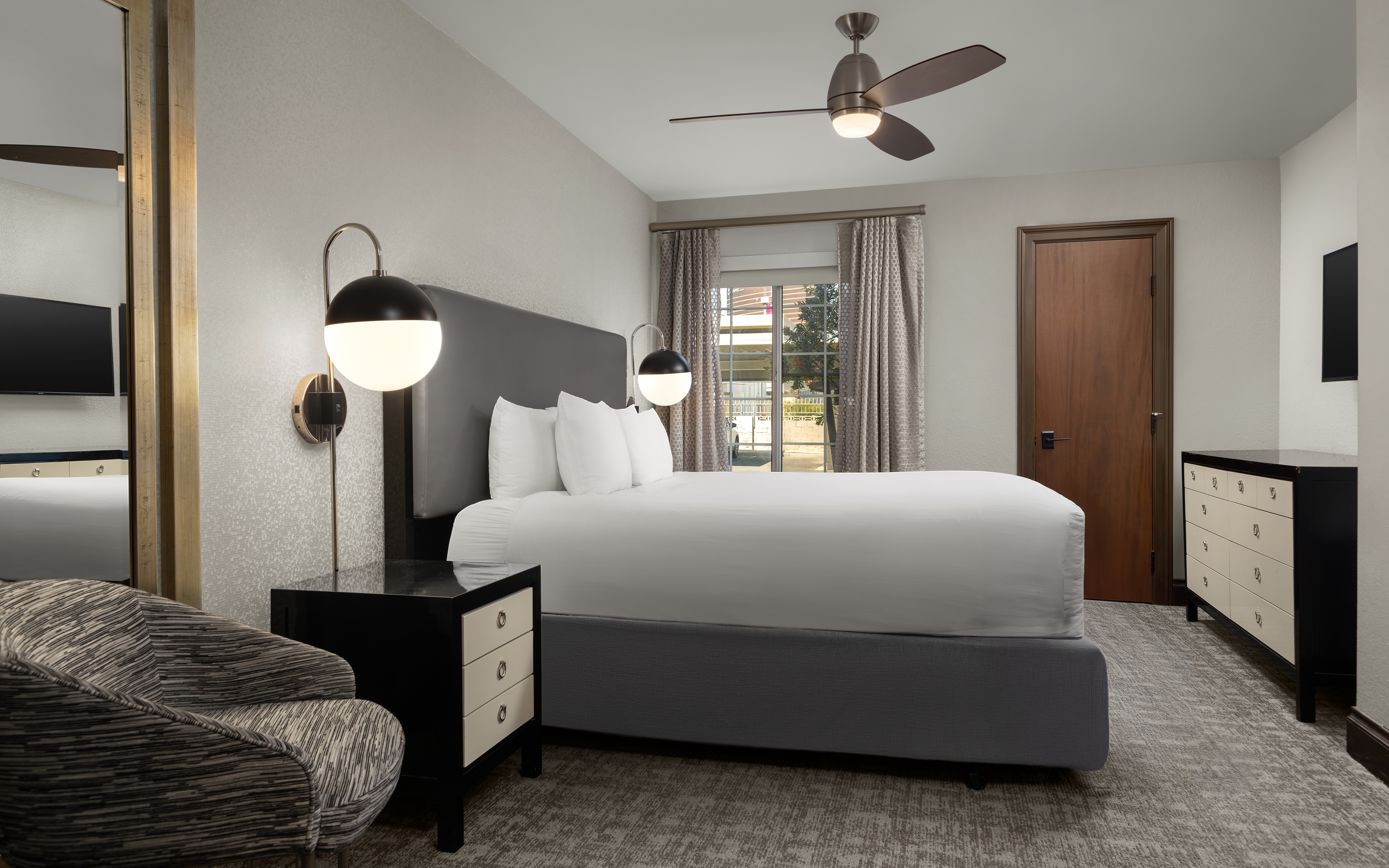 Bedroom with modern lighting and contemporary decor.
