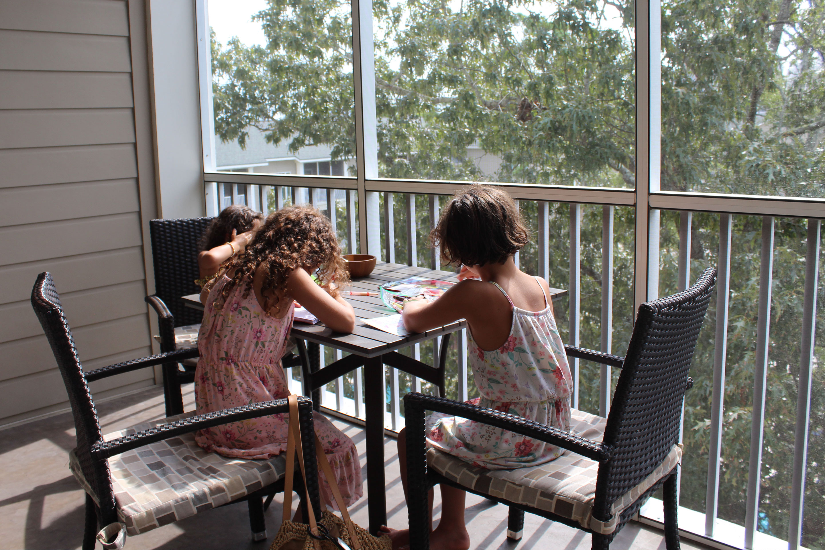 Brenda's daughters journal on the patio of the villa.