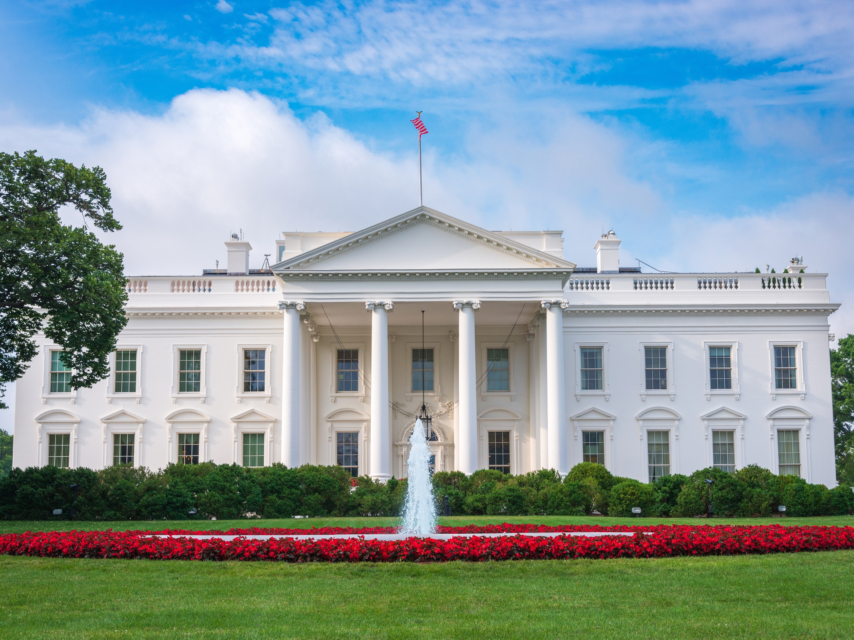 The White House with its fountain and landscaped lawn in Washington, D.C. 