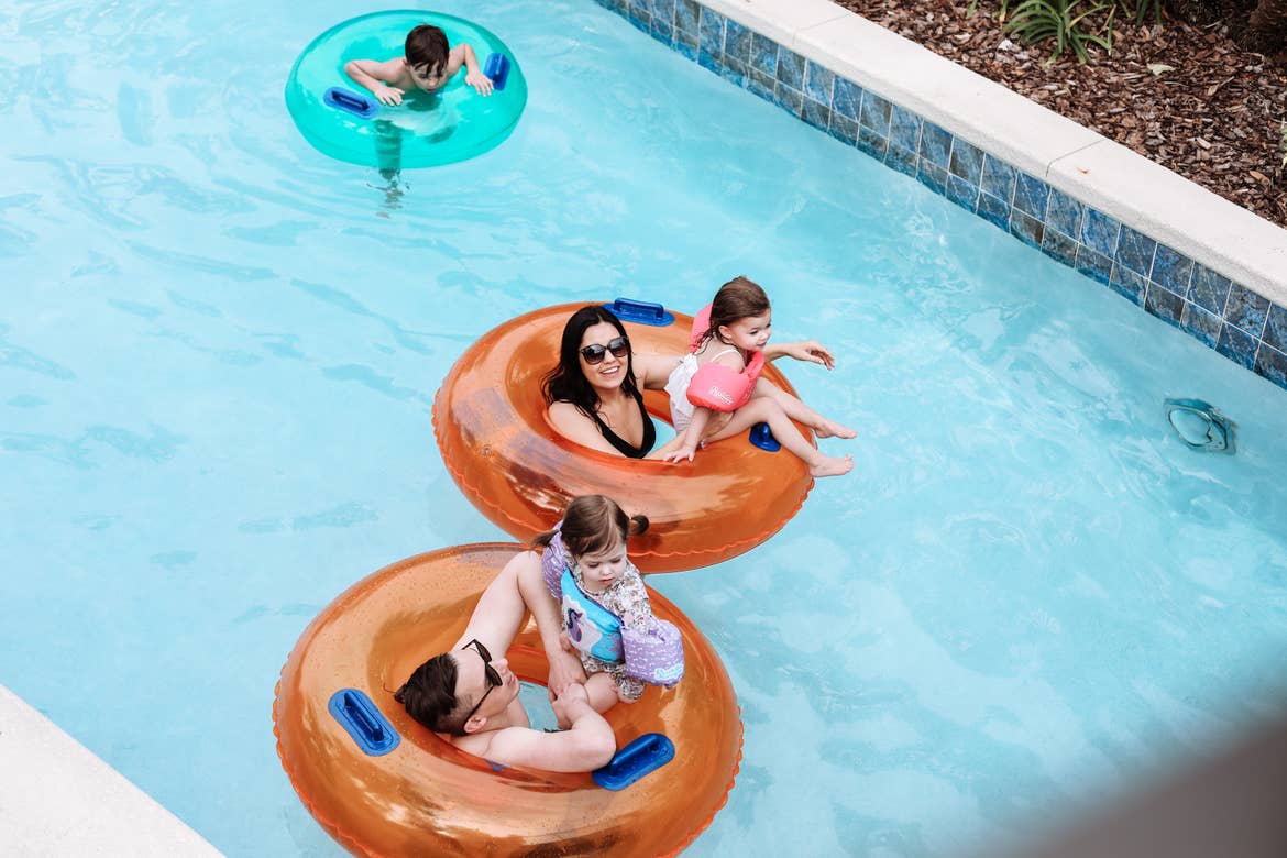 Mia and her family in the lazy river