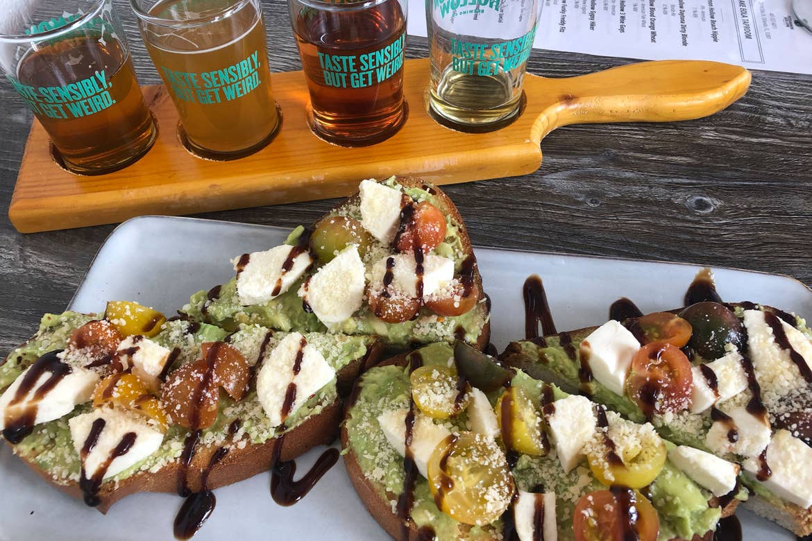 A beer flight and avocado toast from 'Persimmon Hollow.'