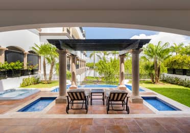 Master suite terrace with private pool and garden views.