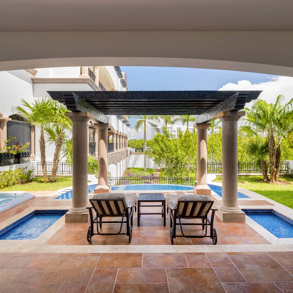 Master suite terrace with private pool and garden views.