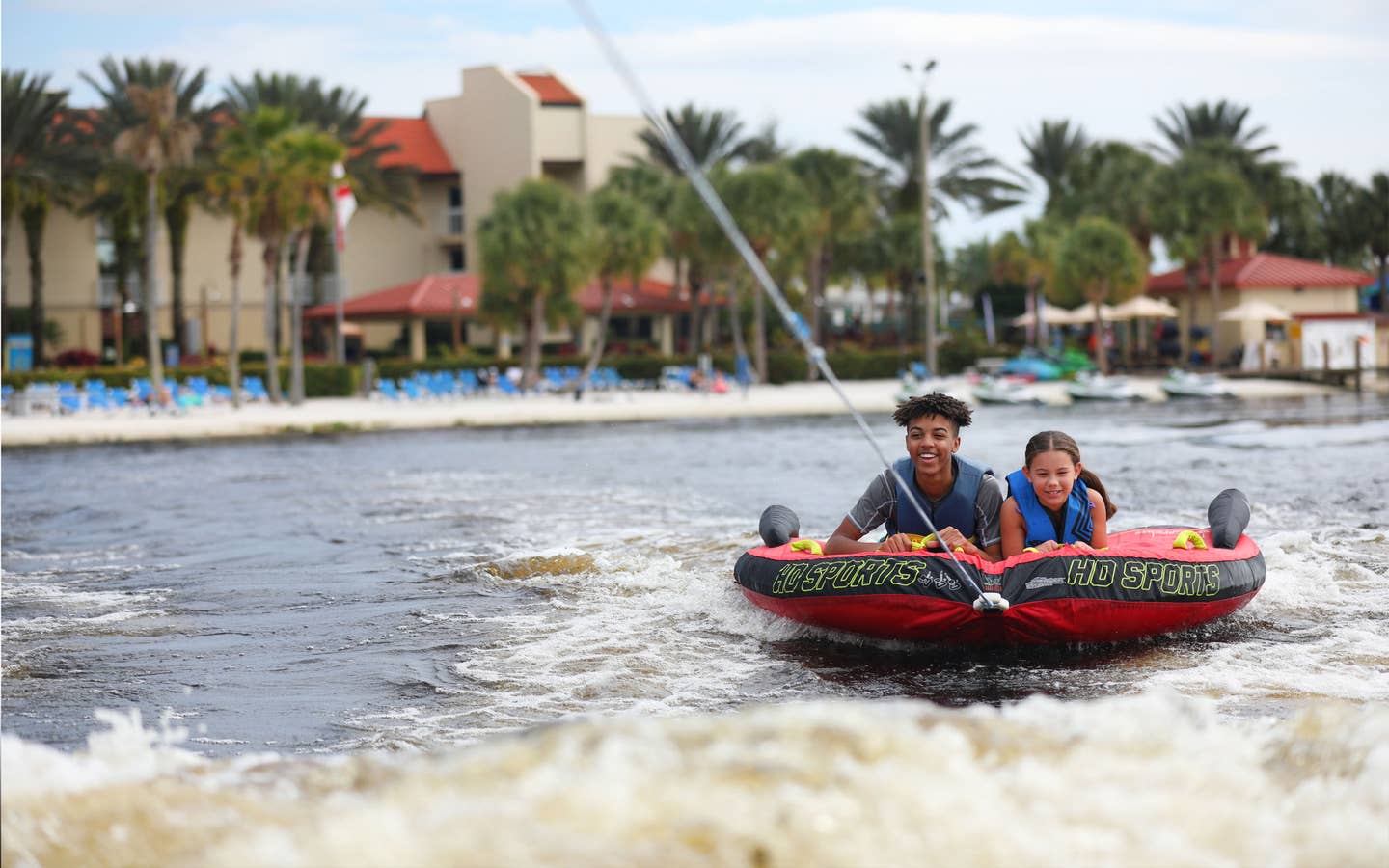 Two children tubing at Orange Lake Resort near Orlando, Florida.
