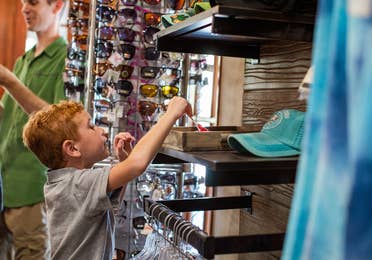 Small child browsing through Marketplace at Hill Country Resort in Canyon Lake, Texas.