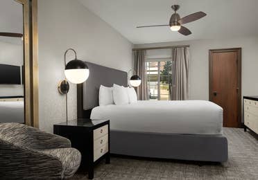 Bedroom with modern lighting and contemporary decor.