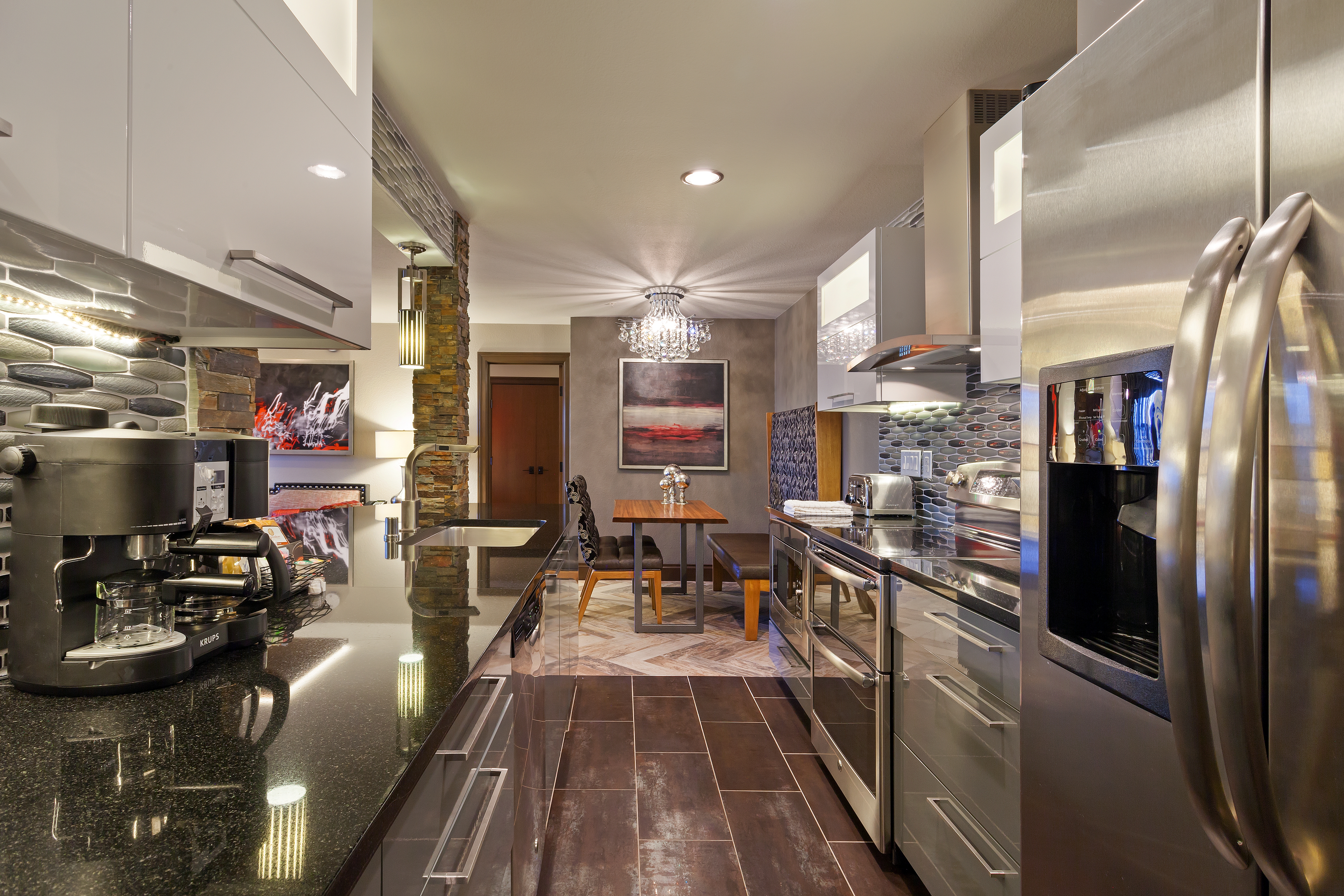 Kitchen and dining area in a Signature Villa at Desert Club Resort in Las Vegas