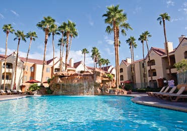 The Watering Hole pool with waterfall at Desert Club Resort in Las Vegas.